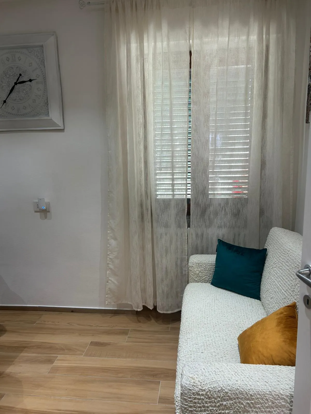 Salottino con divano, angolo relax dell'appartamento